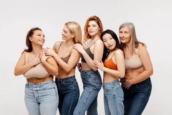 Group Stylish Diverse Multiracial Women Wearing Sexy Bras Jeans Hugging — Stock Photo, Image