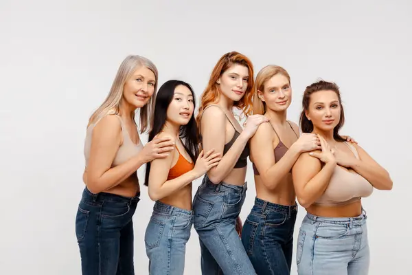 Modern Diverse Multiracial Group Women Wearing Sexy Bras Jeans Hugging — Stock Photo, Image