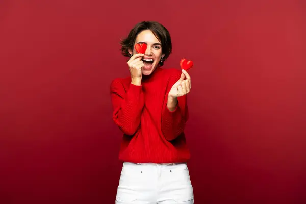Cheerful Happy Woman Smiling Holding Small Hearts Covering One Eye — Stock Photo, Image