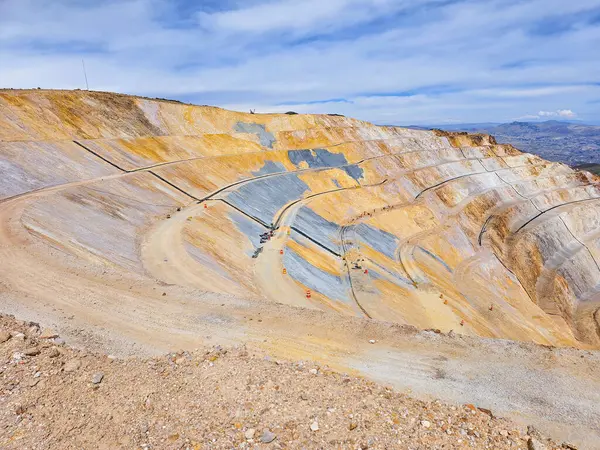 stock image Panoramic view of one side of an open pit mine on a sunny morning