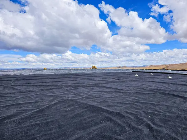 stock image Geosynthetics in mine with geotextile installation to cover mining landfills.