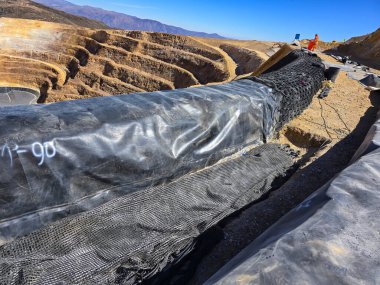 Mayın eğimli dengeleme süreci jeosentetik ve pompalı ile.