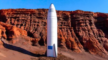 Mars gezegenine benzer bir jeolojik parka yerleştirilmiş bir uzay roketinin eğlence amaçlı figürü.