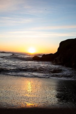 Scenic view of sea against sky at sunset, Fort Bragg, California, United States, USA - stock photo