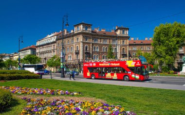 Budapest, Hungary - 27 April 2024: View of Kodaly korond roundabout at the intersection of Andrassy Avenue and Felsoerdosor street, with beautifully painted old buildings. clipart