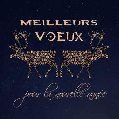 Yıldızlı ve mavi arka planda iki altın ren geyiği ve Noel topları bulunan Fransızca dilek kartı - 
