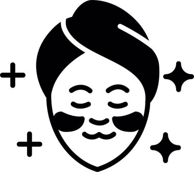 Siyah beyaz sakallı bir adam.