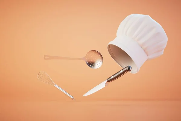 Yemek Konsepti Şef Şapkası Kepçe Bıçak Pastel Arka Planda Çırpma — Stok fotoğraf