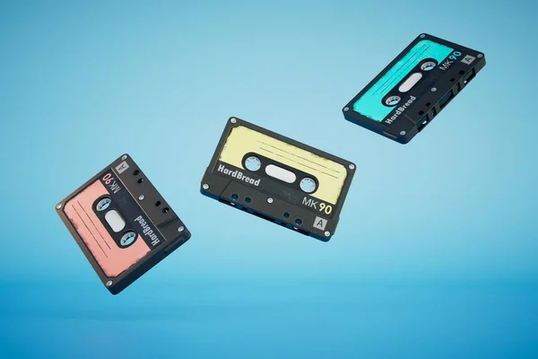 stock image audio cassettes scattering on a blue background. 3D render.