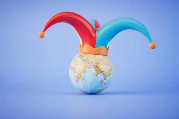 Planet Der Narren Globus Mit Narrenkappe Auf Blauem Hintergrund Renderer lizenzfreie Stockfotos