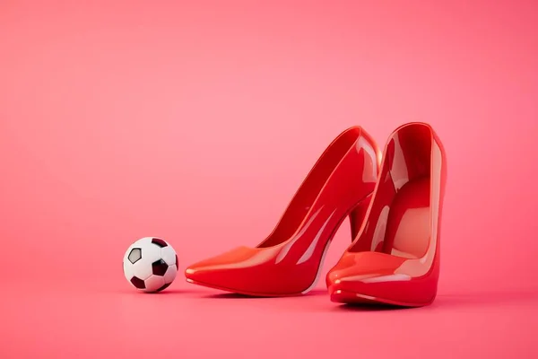 Playing women\'s football. A red heeled shoes and a soccer ball on a red background. 3D render.