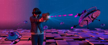 Young latin woman smiling with virtual reality glasses standing with her arms outstretched shooting with her plastic toy gun at spaceships illuminated with blue and red light inside a virtual space