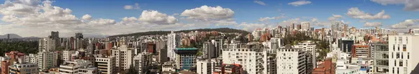 Panoramic view of the north central area of the city of Quito during a cloudy day. Ecuador