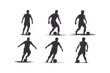 Futbolcu silueti. Siluet takımının siluet oyuncusu topa vuruyor.