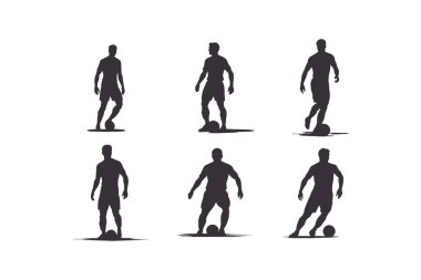 Futbolcu silueti. Siluet takımının siluet oyuncusu topa vuruyor.