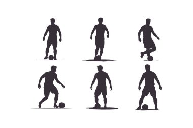 Futbolcu silueti. Siluet takımının siluet oyuncusu topa vuruyor.