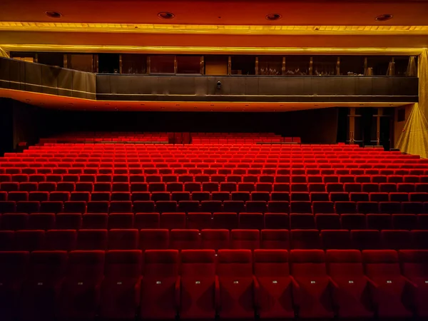 stock image red chairs in the auditorium