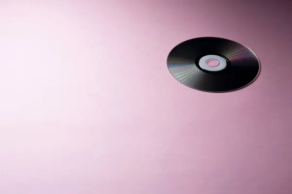 Compact Disc Różowym Tle — Zdjęcie stockowe