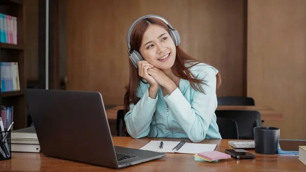 Female Student Wearing Headphone Listening Music Touching Hands Face Relaxation — Stock Photo, Image
