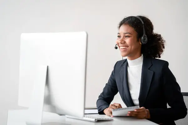 Female call center provides information to a customer calling for help, Contact us, Service with a beautiful and friendly voice, Long call distance communication, Talk using headphones or headsets.