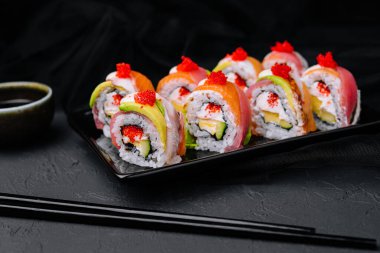sushi rolls of red tuna with salmon