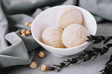 Delicious ice cream with hazelnut close up