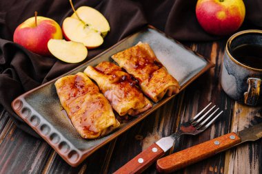 Crepes are homemade. Pancakes with jam