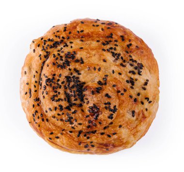 Susam tohumlu taze burulmuş çörek.