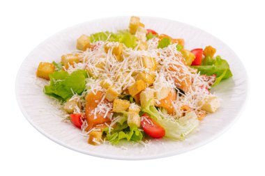 Caesar salad with salmon on white background