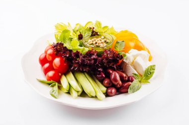 chopped tomatoes, cucumbers, peppers and mozzarella