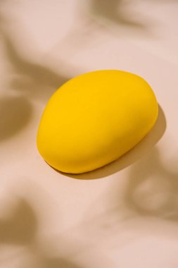 Yellow French mousse-cake on top view