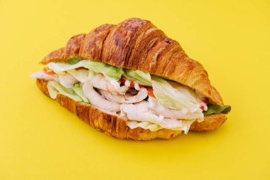 croissant brioche bread with chicken breast and vegetable
