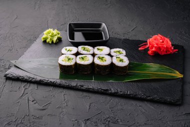 Sushi Maki rolls cucumber on stone