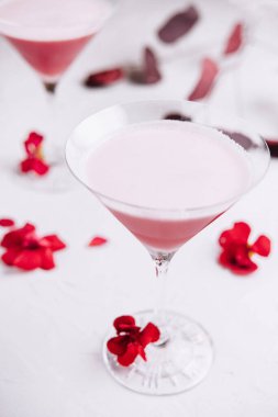 Strawberry alcohol cocktail in martini glasses