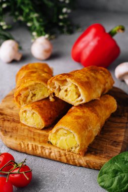 Baking puff pastry with potatoes in the cut