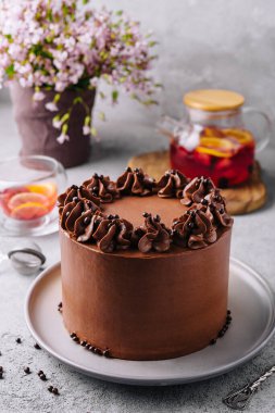 tasty homemade chocolate cake with tea