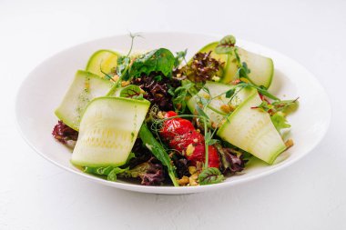 vegetables eggplant, zucchini, pepper salad on plate