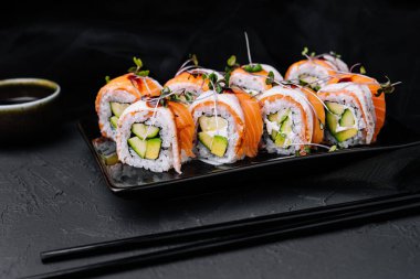 sushi rolls with salmon and eel