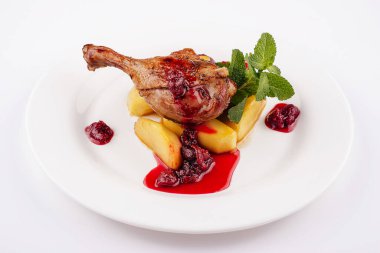 duck leg with potatoes and raspberry jam