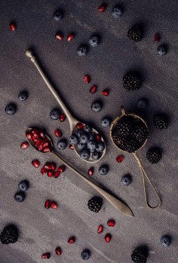 blueberry, blackberry and pomegranate on top view