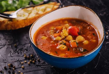 Curry soup with sweet potato, chickpea and red pepper