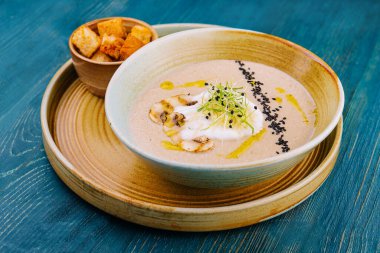 Mushroom cream soup with ingredients top view