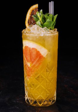 Fresh tropic cocktail with orange and grapefruit