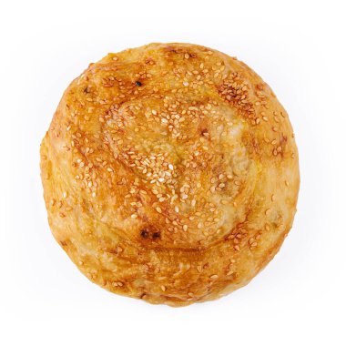 Susam tohumlu taze burulmuş çörek.