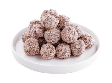 Chocolate truffles triangle on white plate