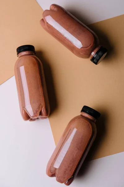 Chocolate Smoothies Milkshake Bottles Brown Background — Foto de Stock