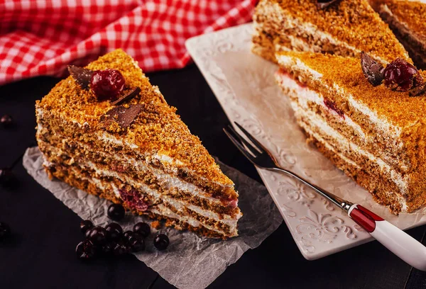 Carrot cake with walnuts and cherry