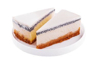 Slices of cheesecake with poppy seeds