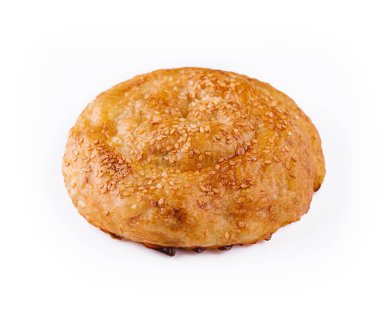 Puff pastry bun rolled up in the form of a snail