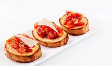 Traditional italian antipasto bruschetta appetizer with cherry tomatoes